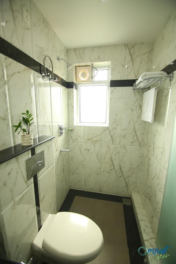 Omnest Hotel Kochi Екстериор снимка