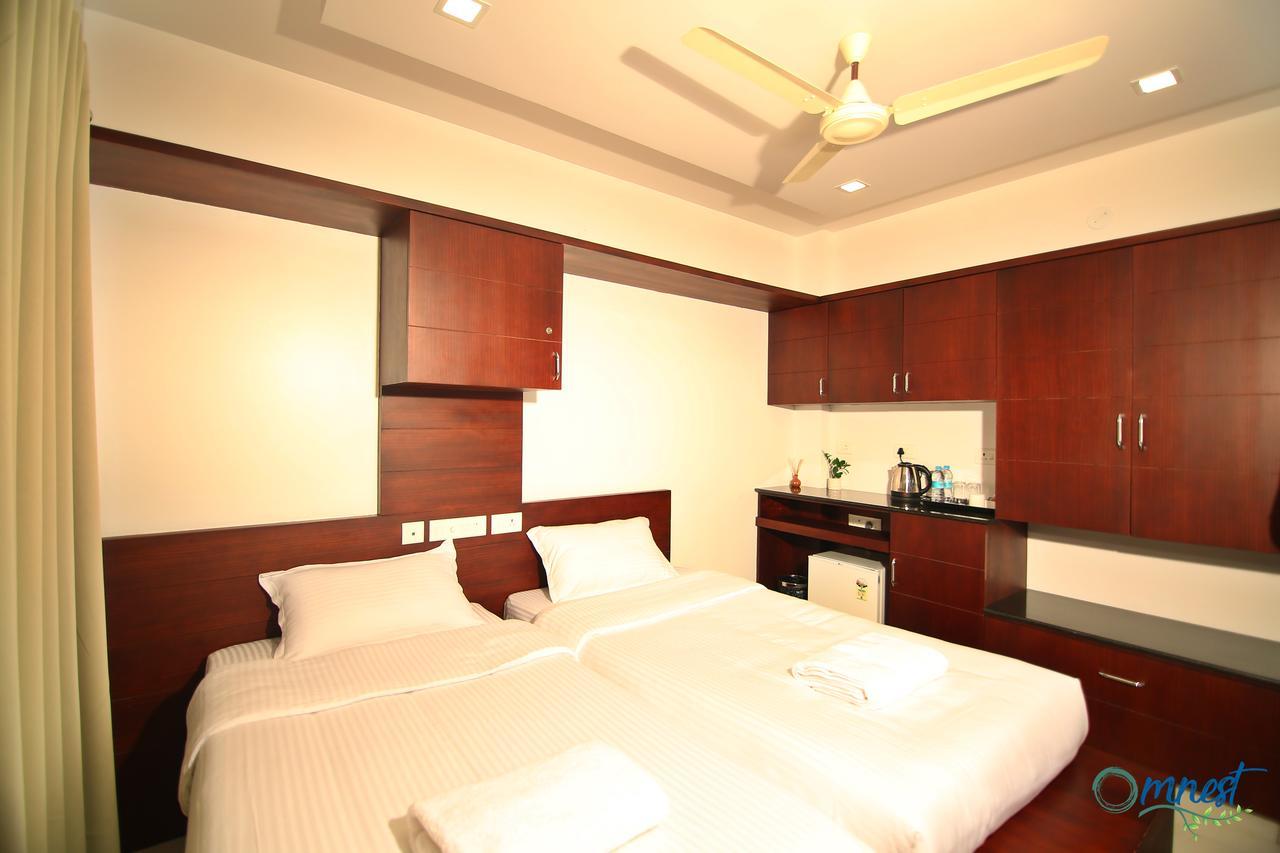 Omnest Hotel Kochi Екстериор снимка